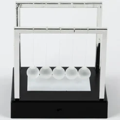 Pendule de Newton lumineux