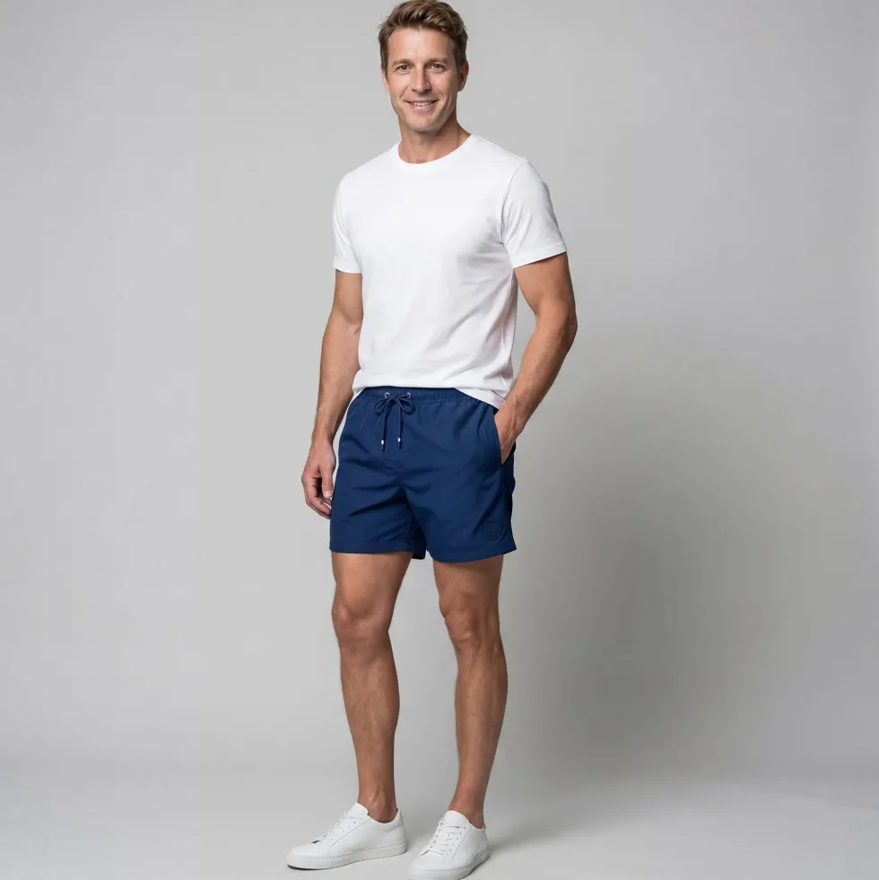 Short de bain bleu uni